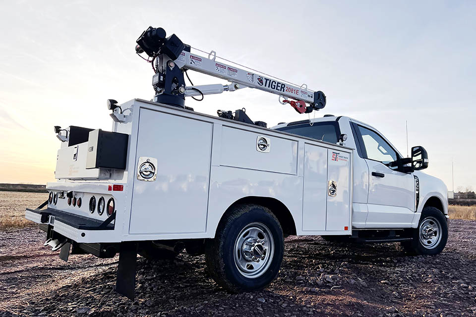 The Seven Heavens rig: a Ford Super Duty carrying a Stellar Tiger 2081E crane